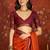 Orange silk cotton zari checks saree with unstitched blouse piece.