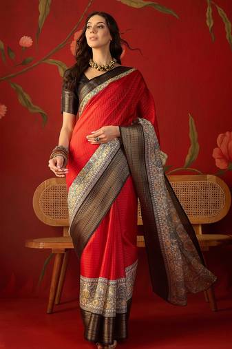 Red silk cotton zari checks saree with unstitched blouse piece.
