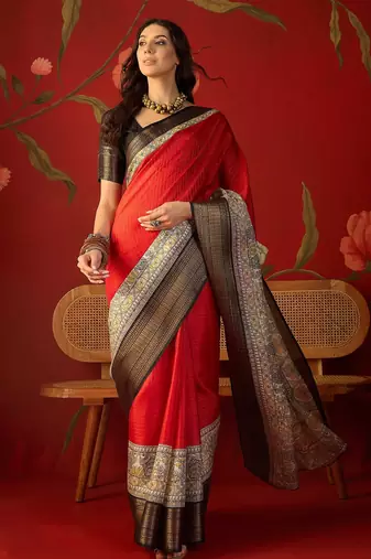 Red silk cotton zari checks saree with unstitched blouse piece.