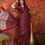 Wine silk cotton printed saree with unstitched blouse piece.