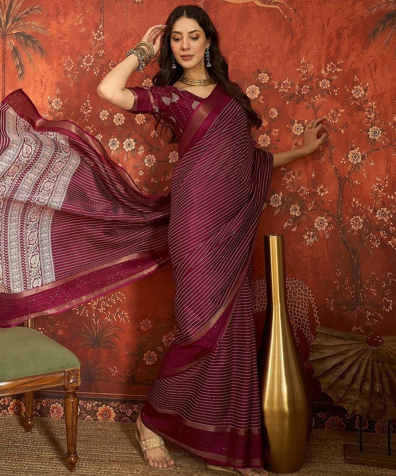 Wine silk cotton printed saree with unstitched blouse piece.