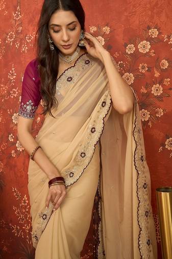 Beige chiffon embroidered saree with unstitched blouse piece.