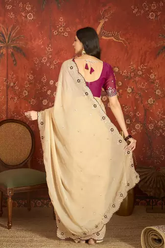 Beige chiffon embroidered saree with unstitched blouse piece.