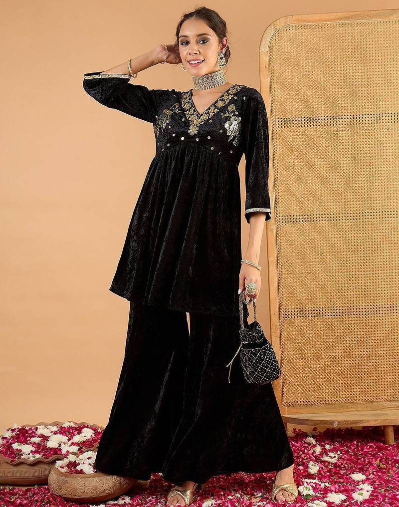 Women Ethnic Motifs Embroidered Tiered Mirror Work Kurti with Palazzos