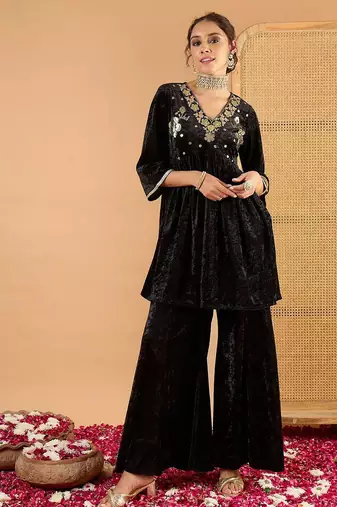 Women Ethnic Motifs Embroidered Tiered Mirror Work Kurti with Palazzos