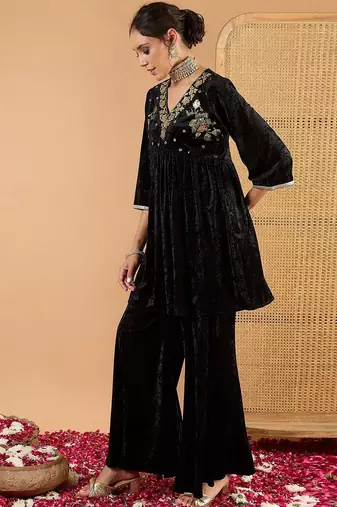 Women Ethnic Motifs Embroidered Tiered Mirror Work Kurti with Palazzos