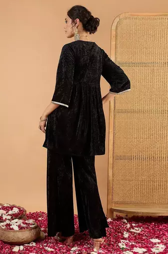 Women Ethnic Motifs Embroidered Tiered Mirror Work Kurti with Palazzos