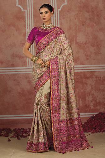 Beige silk blend saree with intricate zari & meenakari weaving