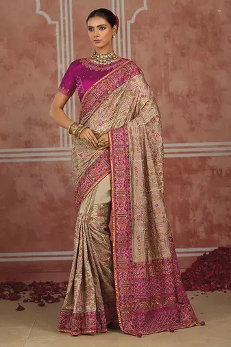 Beige silk blend saree with intricate zari & meenakari weaving