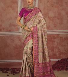 Beige silk blend saree with intricate zari & meenakari weaving