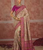 Beige silk blend saree with intricate zari & meenakari weaving