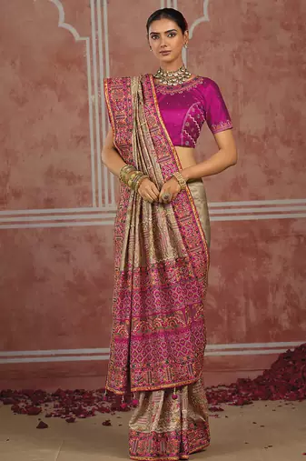 Beige silk blend saree with intricate zari & meenakari weaving