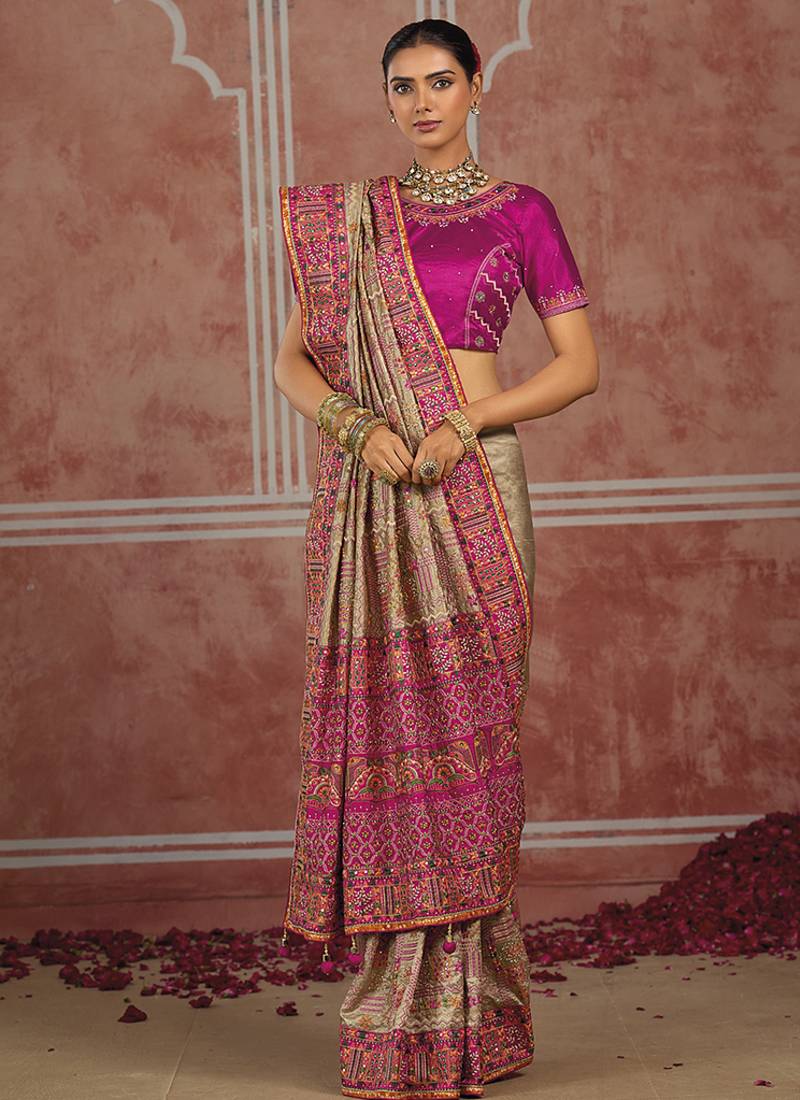 Beige silk blend saree with intricate zari & meenakari weaving