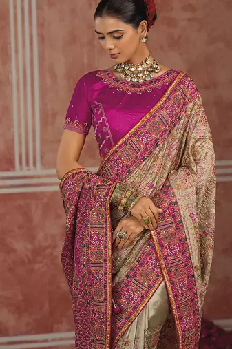 Beige silk blend saree with intricate zari & meenakari weaving