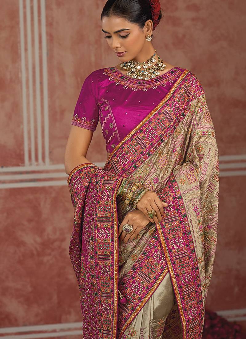 Beige silk blend saree with intricate zari & meenakari weaving