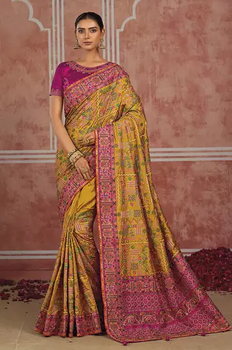 Mustard yellow silk blend saree with intricate zari & meenakari weaving