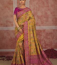 Mustard yellow silk blend saree with intricate zari & meenakari weaving
