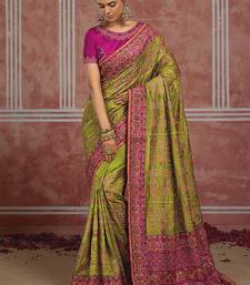 Parrot green silk blend saree with intricate zari & meenakari weaving