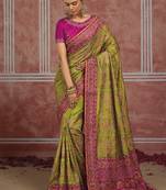 Parrot green silk blend saree with intricate zari & meenakari weaving