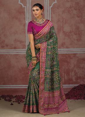 Bottle green silk blend saree with intricate zari & meenakari weaving 1