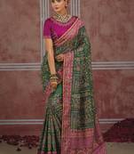 Bottle green silk blend saree with intricate zari & meenakari weaving