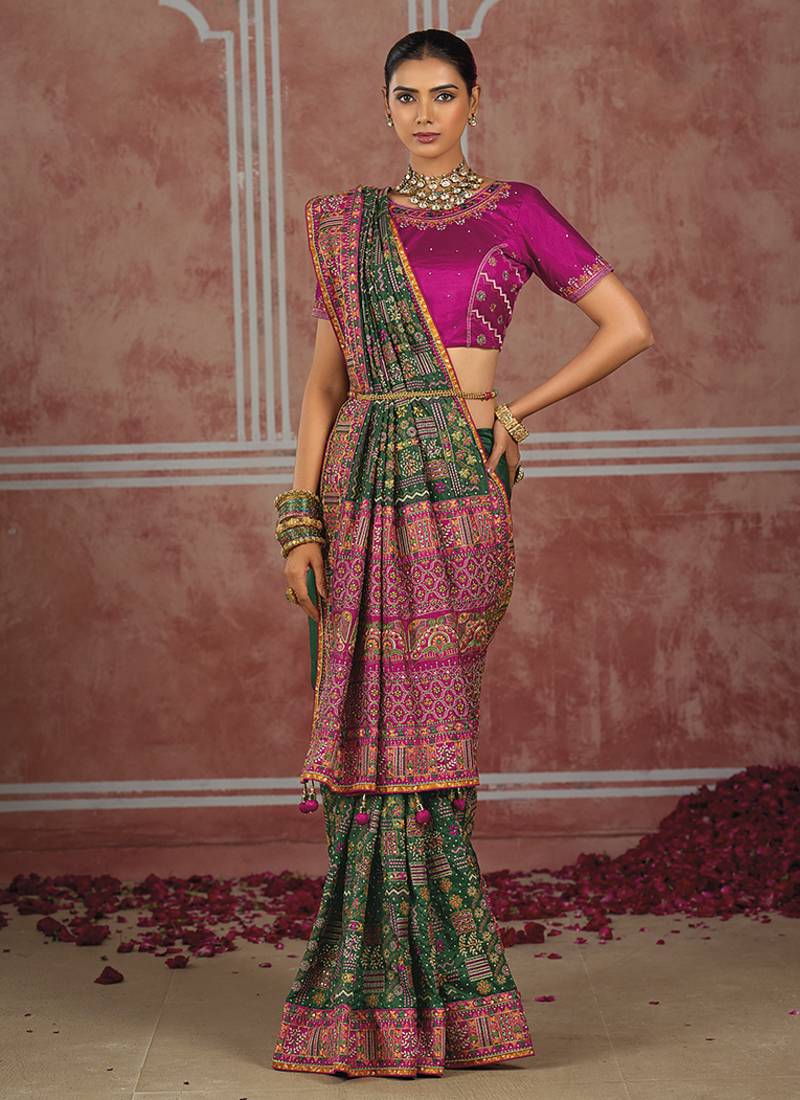 Bottle green silk blend saree with intricate zari & meenakari weaving