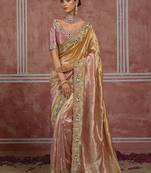 Golden & pink embroidered silk blend saree