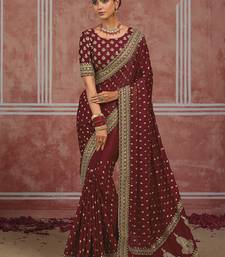 Maroon embroidered silk blend saree