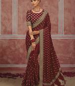 Maroon embroidered silk blend saree