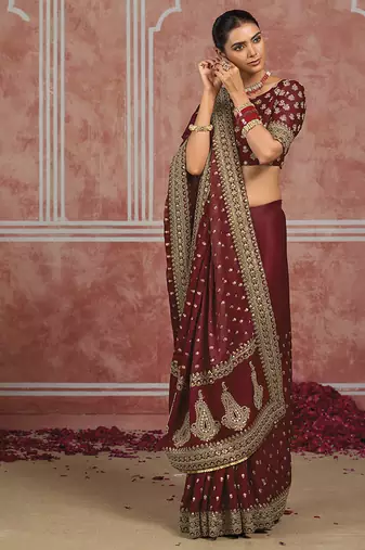 Maroon embroidered silk blend saree