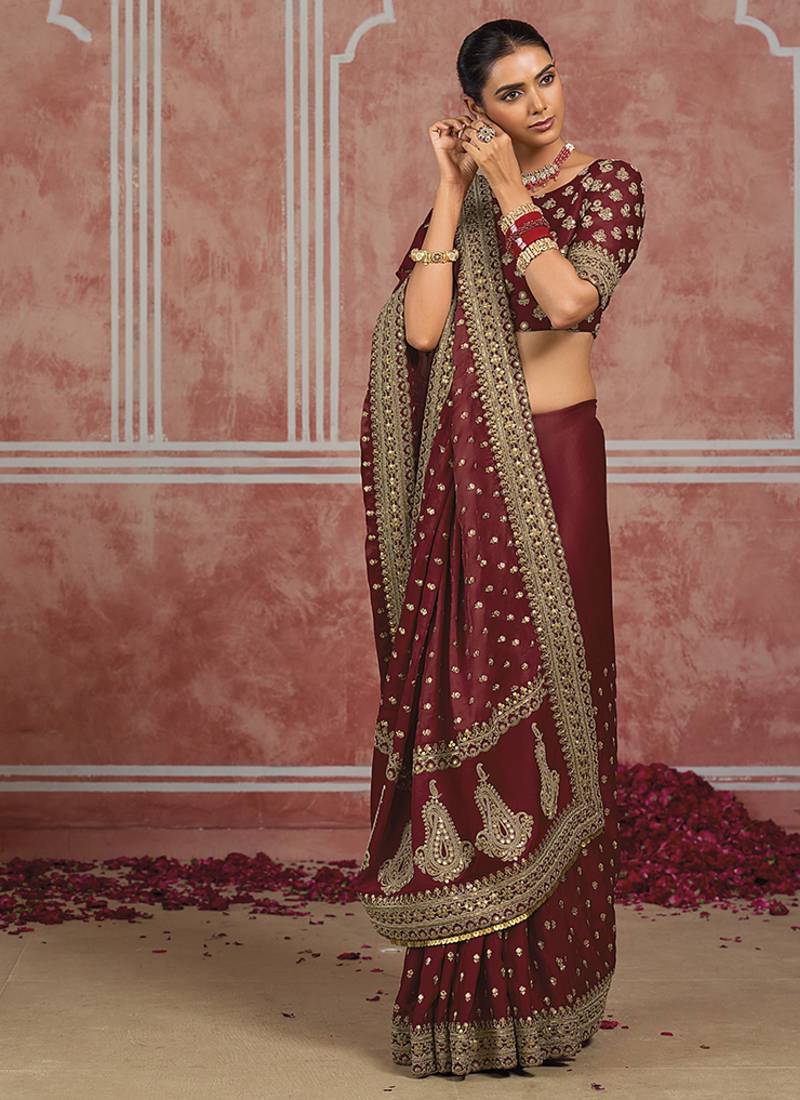 Maroon embroidered silk blend saree