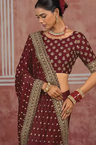 Maroon embroidered silk blend saree