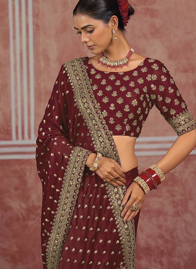 Maroon embroidered silk blend saree