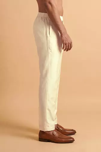 Men cream modal relaxed straight fit regular trousers