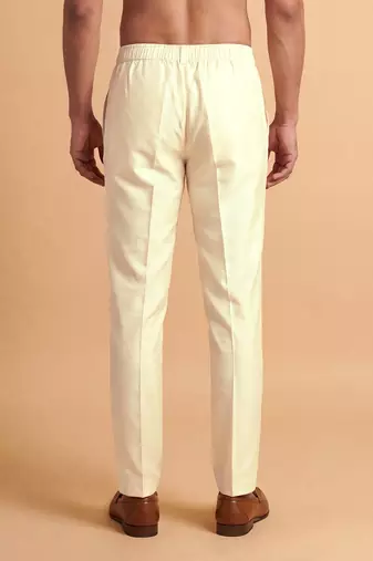 Men cream modal relaxed straight fit regular trousers