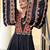 Ethnic motifs embroidered v-neck flared sleeves thread work thread work angrakha kurti