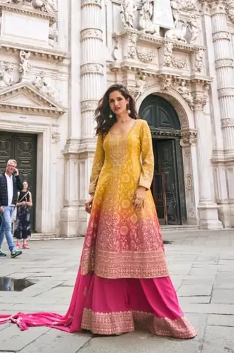Yellow and pink georgette full stitched sharara suits free size upto 44