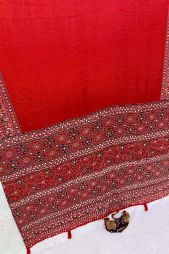 Red Beautiful Ajarakh print with mirror work and beautiful tussle Silk Blend Saree