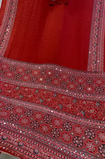 Red Beautiful Ajarakh print with mirror work and beautiful tussle Silk Blend Saree