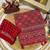 Red Color Beautiful Ajarakh print with Real mirror work and beautiful tussle Silk Blend Saree