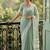 Sea green cotton silk blend saree with intricate woven border