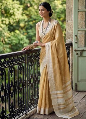 Mustard yellow cotton silk blend saree with intricate woven border 1