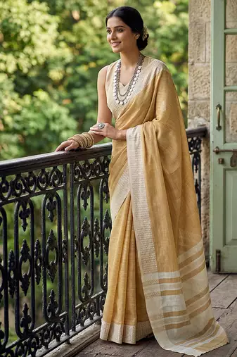 Mustard yellow cotton silk blend saree with intricate woven border