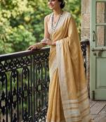 Mustard yellow cotton silk blend saree with intricate woven border