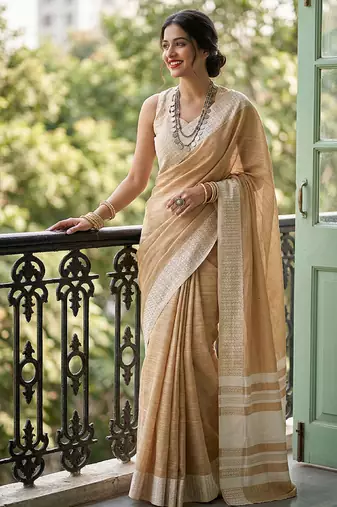 Mustard yellow cotton silk blend saree with intricate woven border