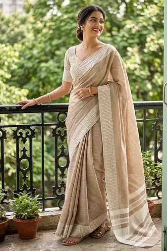 Beige cotton silk blend saree with intricate woven border