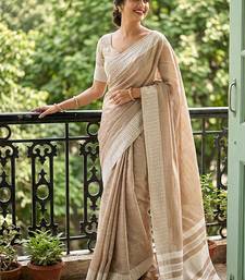 Beige cotton silk blend saree with intricate woven border