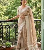 Beige cotton silk blend saree with intricate woven border