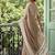 Beige cotton silk blend saree with intricate woven border