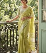 Lime green cotton silk blend saree with intricate woven border